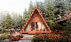 Natural Prefabricated Triangular Timber Frame Wooden House with Comfortable Terrace Bedroom Luxury Villa Prefab Tiny Log House manufacturer